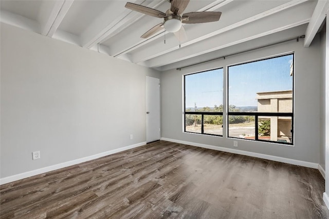 empty room with beam ceiling, wood-type flooring, and ceiling fan