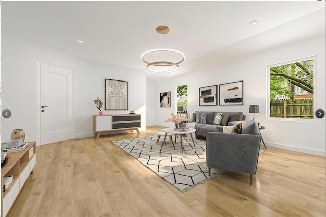 living room with light hardwood / wood-style flooring