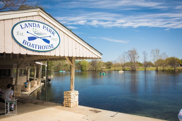 dock area featuring a water view