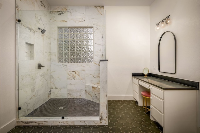 bathroom with a tile shower