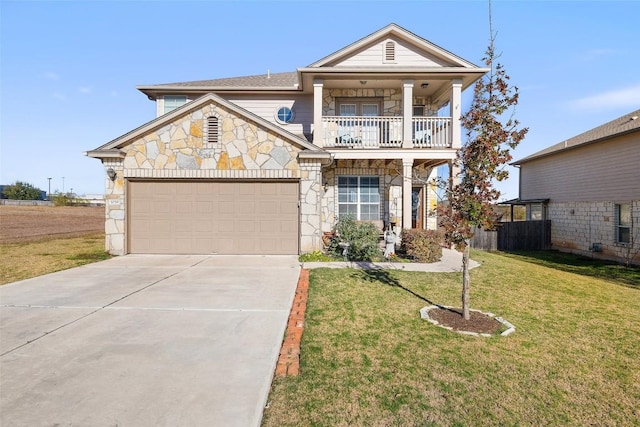 view of front of home featuring a balcony, a garage, and a front lawn