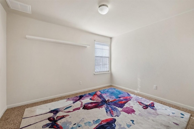 unfurnished room with carpet