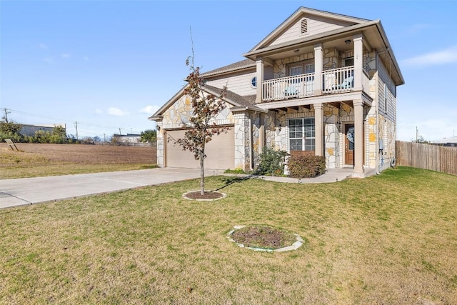 view of front facade featuring a garage, a balcony, and a front lawn