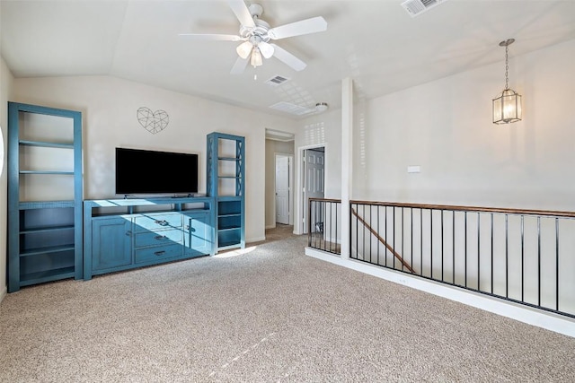 unfurnished living room with carpet, lofted ceiling, and ceiling fan