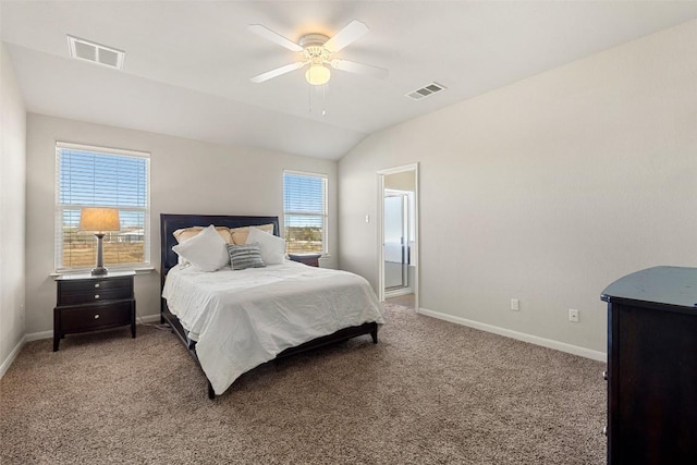 bedroom featuring vaulted ceiling, carpet floors, and ceiling fan