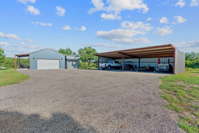 exterior space featuring a garage and a carport