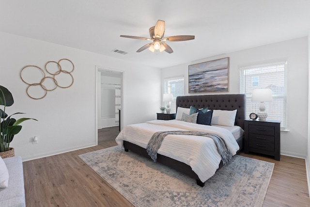 bedroom featuring wood-type flooring and ceiling fan