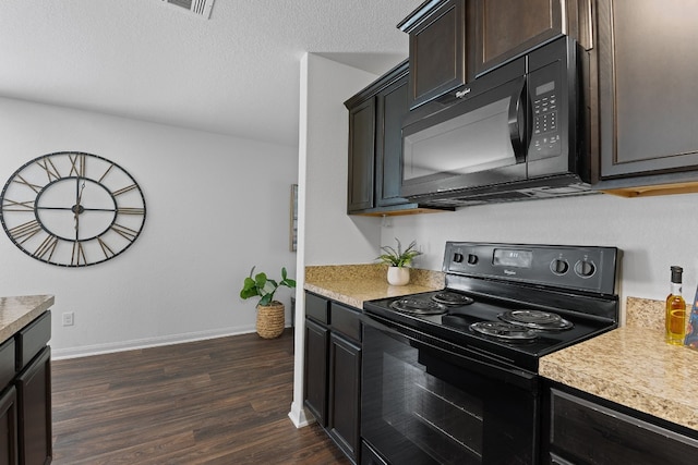 kitchen with dark brown cabinets, dark hardwood / wood-style floors, a textured ceiling, and black appliances