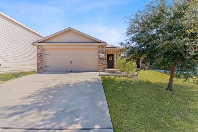 view of front facade with a garage and a front lawn