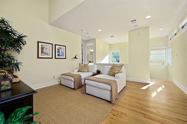 living room with light hardwood / wood-style floors