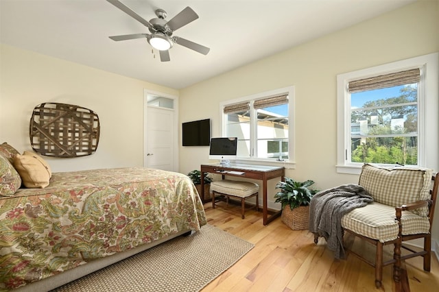 bedroom featuring ceiling fan and light hardwood / wood-style floors