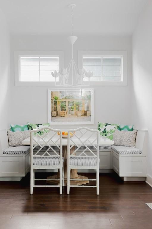 1911 W 36th St, Austin, TX 78731 - dining area featuring wood finished floors, a chandelier, and breakfast area