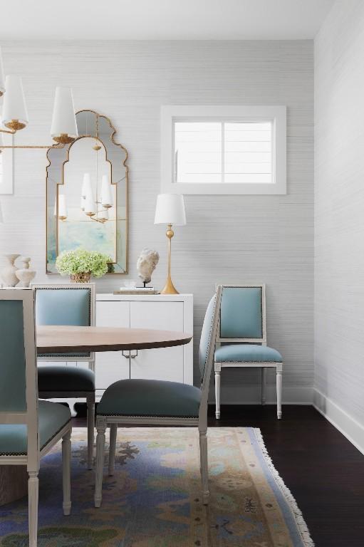 unfurnished room featuring hardwood / wood-style flooring and a chandelier