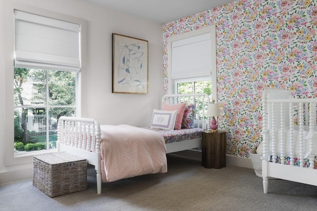 1911 W 36th St, Austin, TX 78731 - carpeted bedroom with wallpapered walls and baseboards