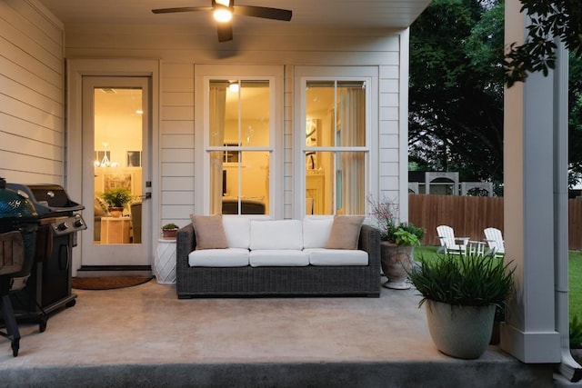 view of patio with a grill, outdoor lounge area, and ceiling fan