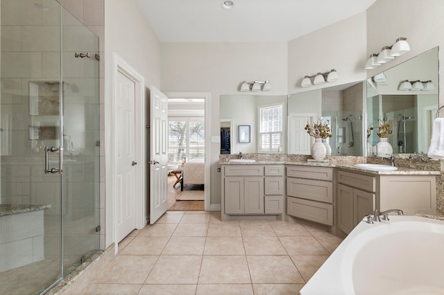 bathroom with vanity, separate shower and tub, and tile patterned flooring