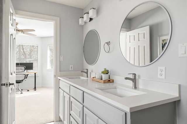 bathroom featuring ceiling fan and vanity