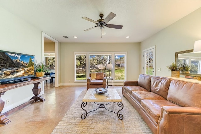 living room with ceiling fan