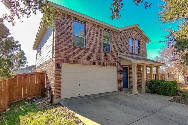 view of front of property featuring a garage