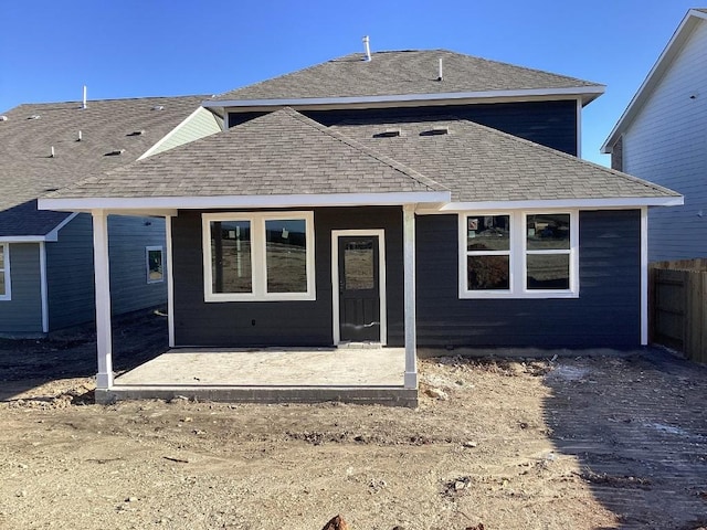 rear view of property featuring a patio