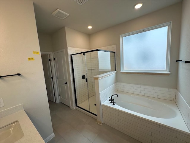 bathroom featuring visible vents, a stall shower, a sink, recessed lighting, and a bath