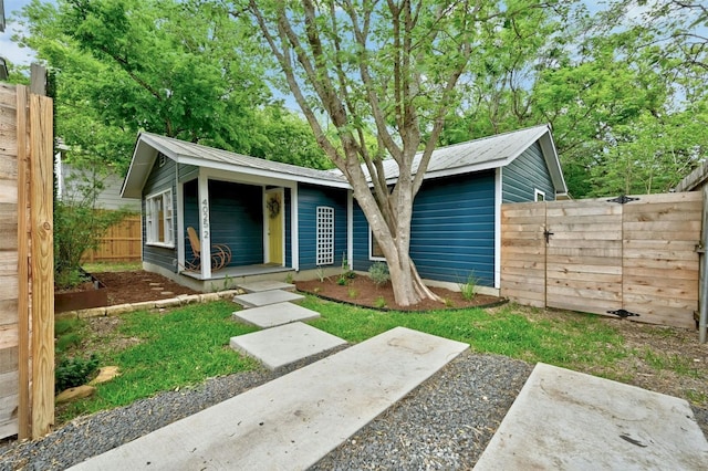 4025 Valley View Rd Unit 2, Austin, TX 78704 - view of front of home featuring a metal roof and a porch