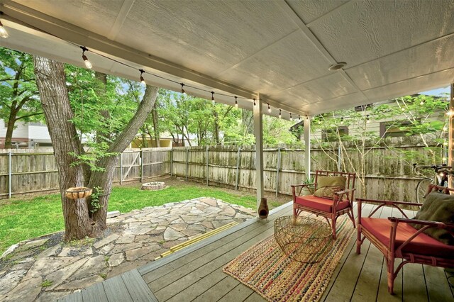 4025 Valley View Rd Unit 2, Austin, TX 78704 - wooden terrace featuring a fenced backyard and a patio area