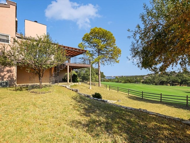 view of yard with a wooden deck