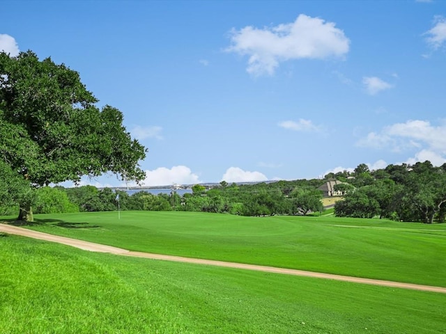 surrounding community featuring a yard