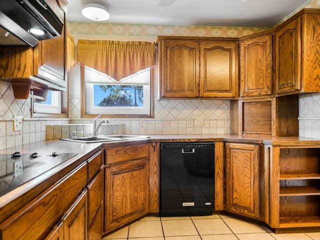 kitchen with sink, light tile patterned floors, range hood, black appliances, and decorative backsplash