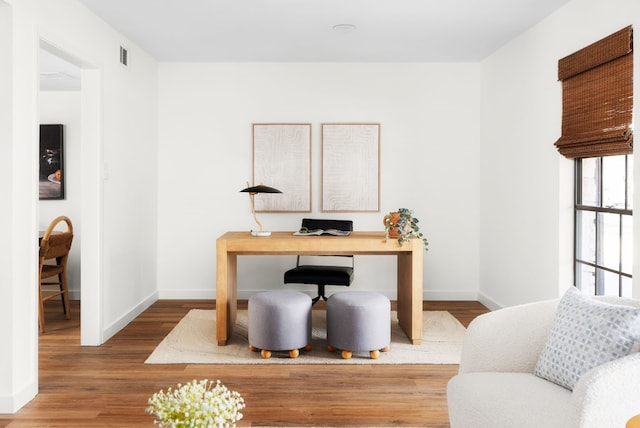 office area with wood-type flooring