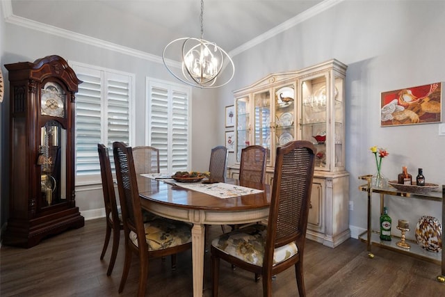 dining space featuring dark wood-type flooring, ornamental molding, and a chandelier