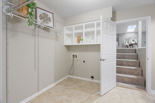 1043 Windmill Rd, Dripping Springs, TX 78620 - washroom with hookup for a washing machine, hookup for an electric dryer, a skylight, and baseboards