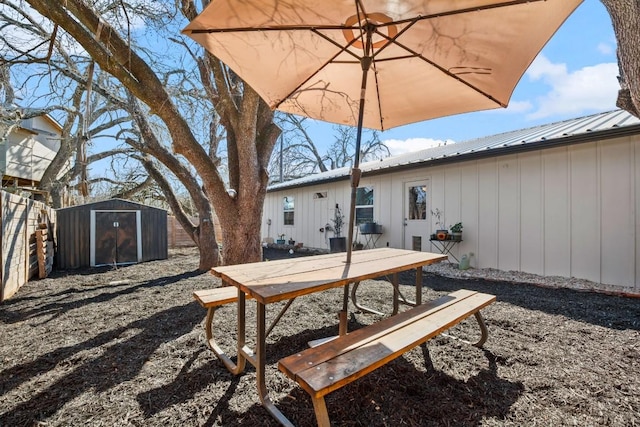 view of patio / terrace with a storage unit