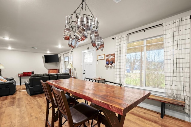 dining area with light wood-type flooring