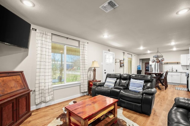 living room featuring light hardwood / wood-style floors