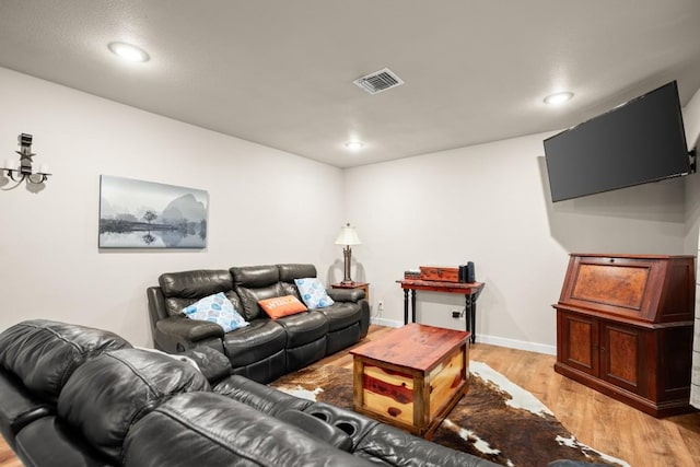 living room with light hardwood / wood-style floors