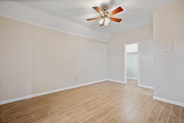 unfurnished room with lofted ceiling, light hardwood / wood-style flooring, and ceiling fan