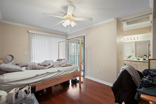 bedroom with dark wood-type flooring, ensuite bath, crown molding, and access to outside