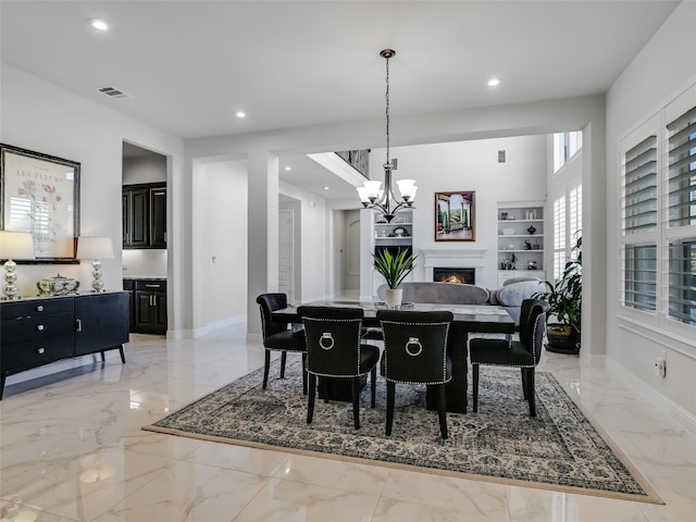 dining room featuring a chandelier