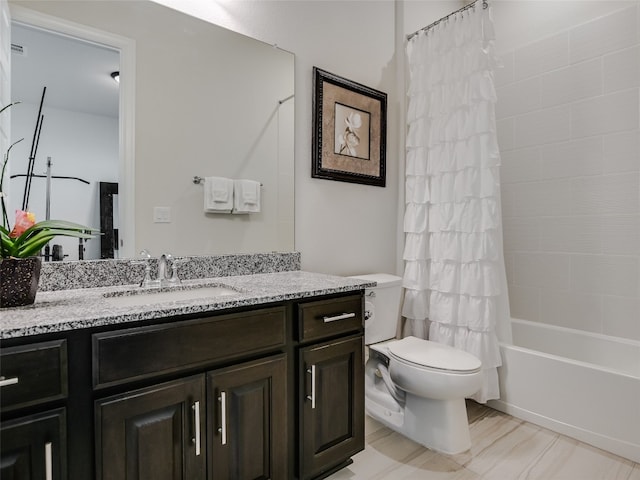 full bathroom featuring vanity, toilet, and shower / bath combo with shower curtain