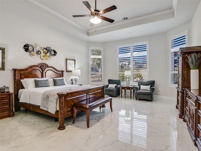 bedroom with a raised ceiling, ornamental molding, and ceiling fan