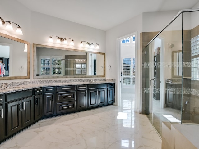 bathroom featuring vanity and walk in shower