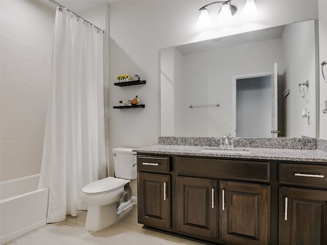 full bathroom featuring toilet, vanity, and shower / bathtub combination with curtain