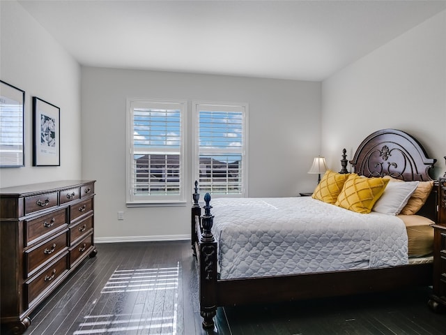 bedroom featuring dark wood-type flooring