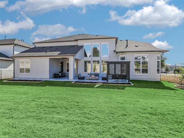 back of house featuring a yard, outdoor lounge area, and a patio area