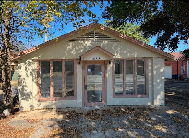 1207 NE Loop 230th Loop, Smithville, TX 78957 - view of front of property with stucco siding