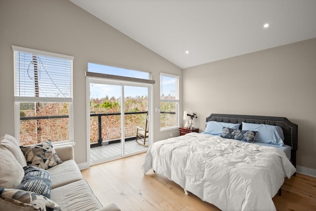 bedroom featuring baseboards, access to exterior, light wood-style floors, high vaulted ceiling, and recessed lighting