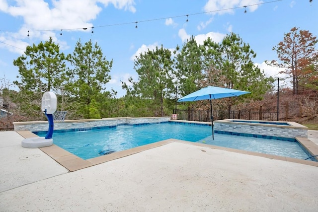 view of pool with a fenced in pool, a patio area, fence, and an in ground hot tub