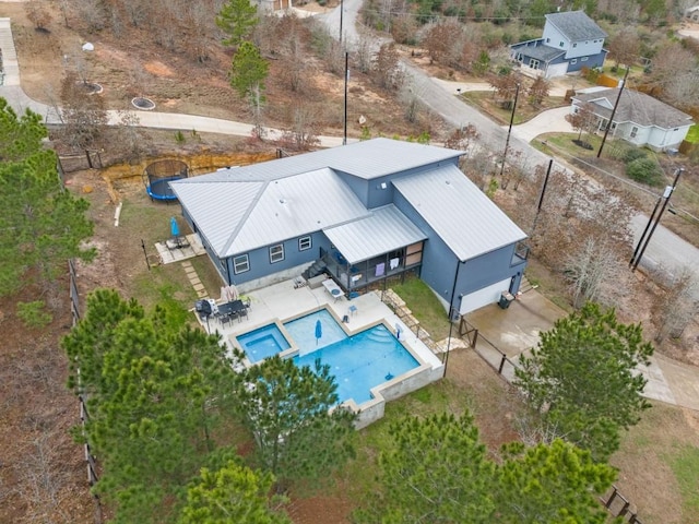209 Kipahulu Dr, Bastrop, TX 78602 - view from above of property featuring a pool